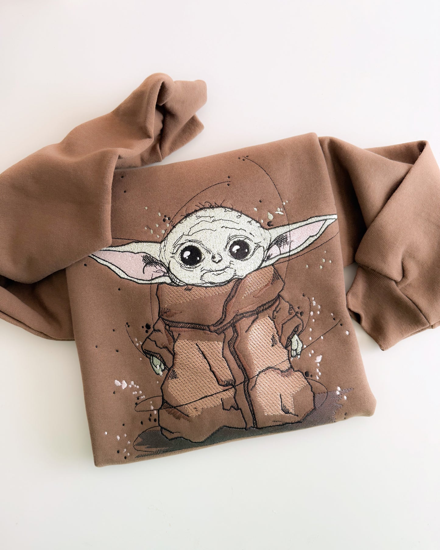 THE CHILD EMBROIDERY