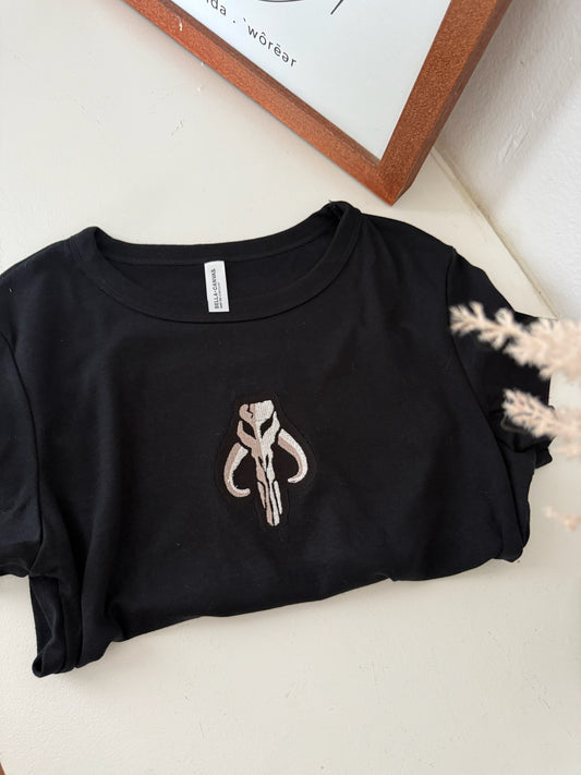 THE BOUNTY HUNTER EMBROIDERED BABY TEE
